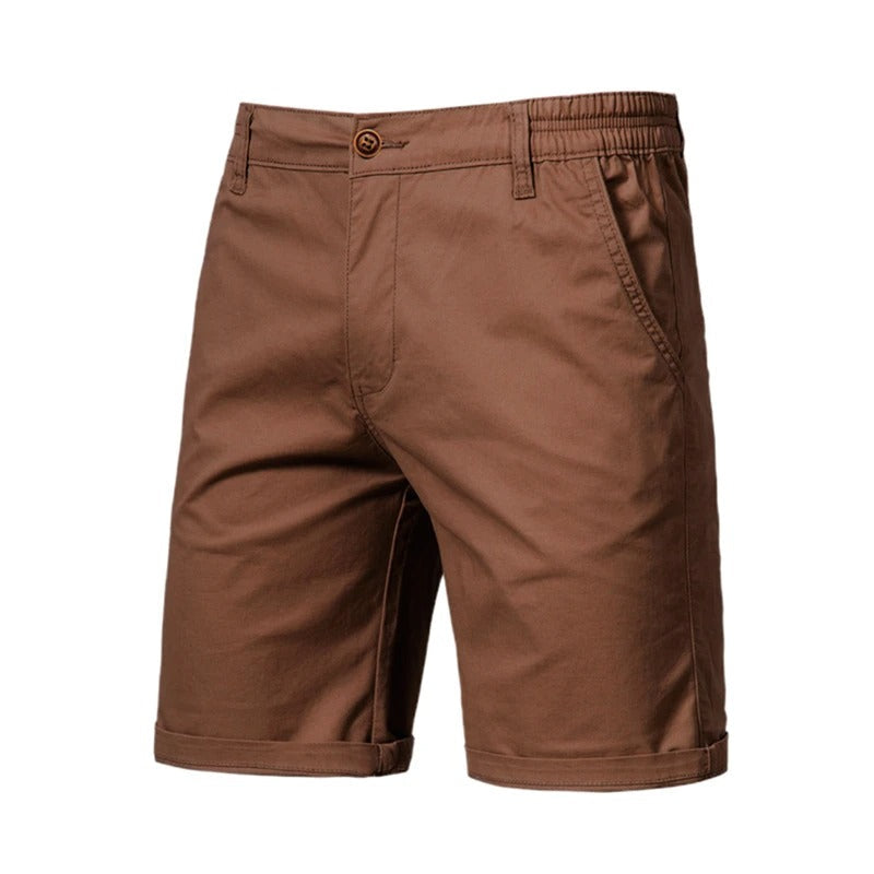 Minimalistisk, ensfarget herreshorts, komfortabel og pustende for en avslappet sommerlook.