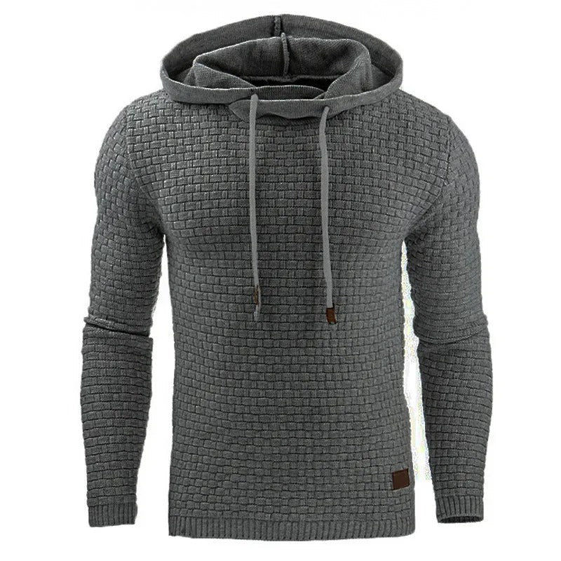 Menns ensfarget hettegenser med lange ermer. Stilfull og komfortabel fritidsklær for casual mote.