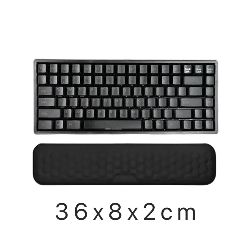 Ergonomisk håndleddsstøtte i memory foam for komfortabel datamaskinbruk og bedre arbeidsstilling.