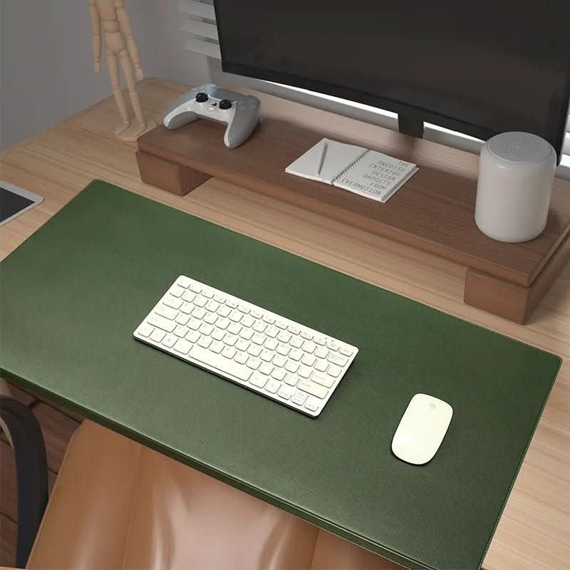 Svart, sklisikker og ergonomisk skrivebordsmatte med håndleddsstøtte for optimal arbeidsflate.