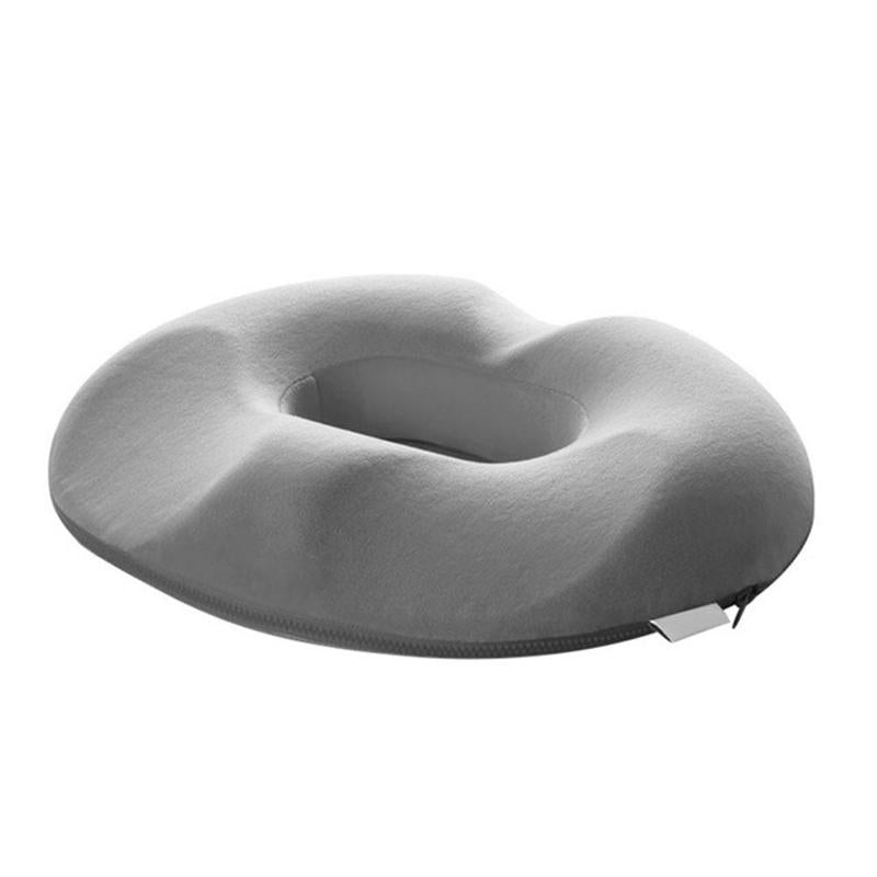 "Ergonomisk trykkavlastende pute i svart minneskum, perfekt for komfortabel sitting og lindring av smerte."