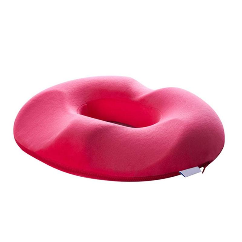 "Ergonomisk trykkavlastende pute i svart minneskum, perfekt for komfortabel sitting og lindring av smerte."