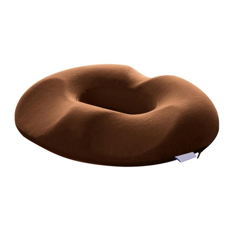 "Ergonomisk trykkavlastende pute i svart minneskum, perfekt for komfortabel sitting og lindring av smerte."