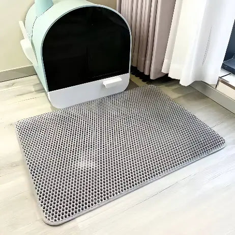 Elegant design: Svart EVA-kattesandmatte, sklisikker og vanntett, ideell for ethvert kattehjem.