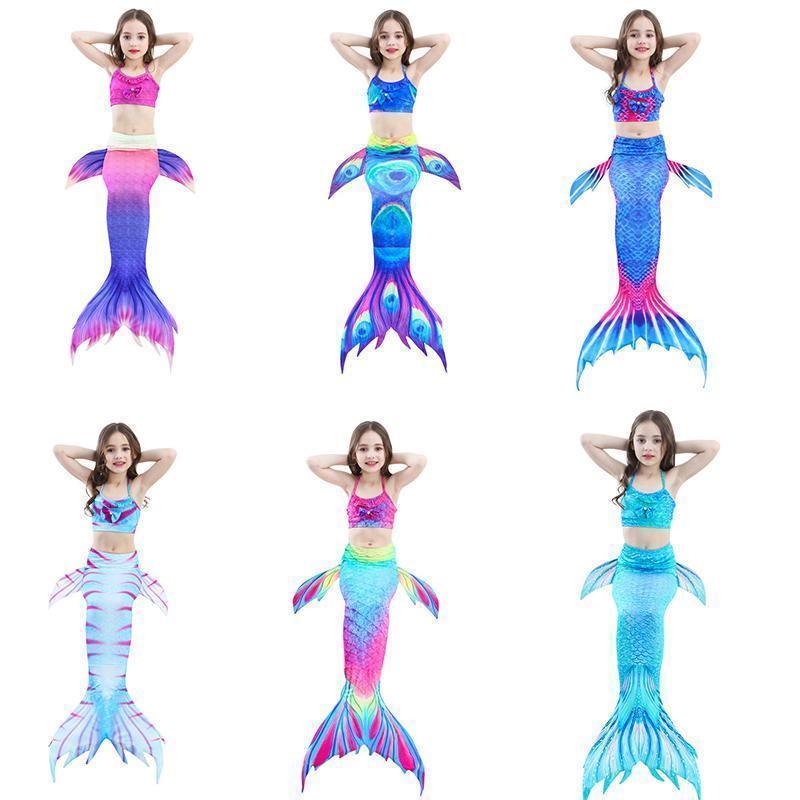 "Fantasifull havfrue badedrakt for barn, flerfarget design med topp, shorts og fiskehale, perfekt for svømming og cosplay."