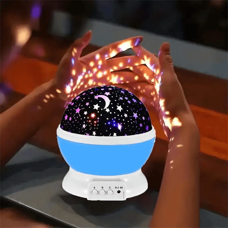 Portabel stjerneprojektor nattlampe for barn, lyser opp barnerommet med fargerike stjerner og måne, USB-lading