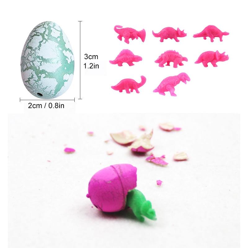 "Fargerikt dinosaur klekkegg i vann, påskeoverraskelse for barn; liten dinosaur klekkes ut og vokser."
