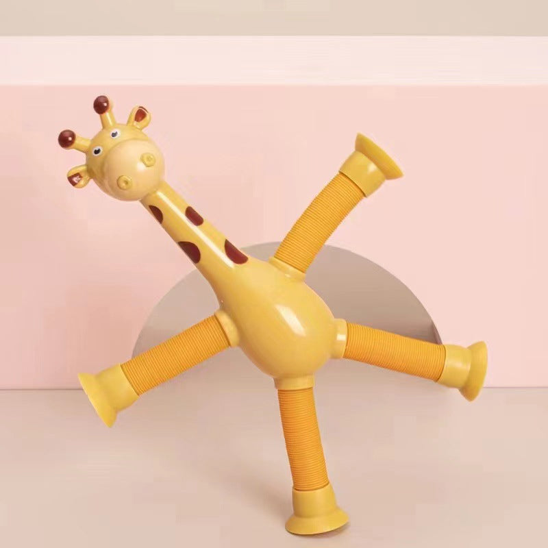 "Fargerikt teleskopisk giraffleketøy med sugekopp. Livlige farger som rosa, blå, lilla og gul, formbar og morsom for barn."