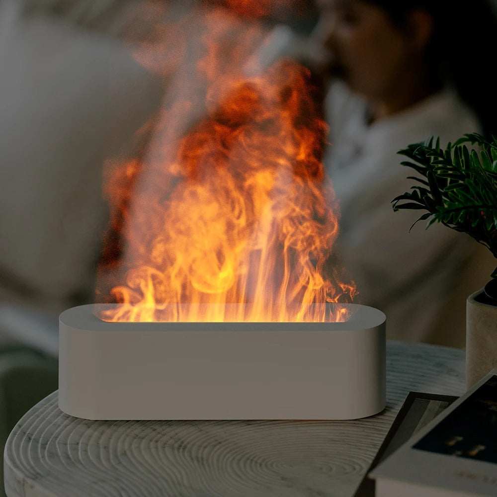 Stilren flamme luftfukter som skaper koselig atmosfære og fukter luften. Perfekt for hjeminnredning.