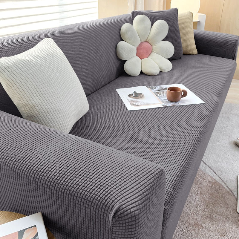 Elastisk møbelbeskyttelse for sofa, ideell for hjem med barn og dyr.