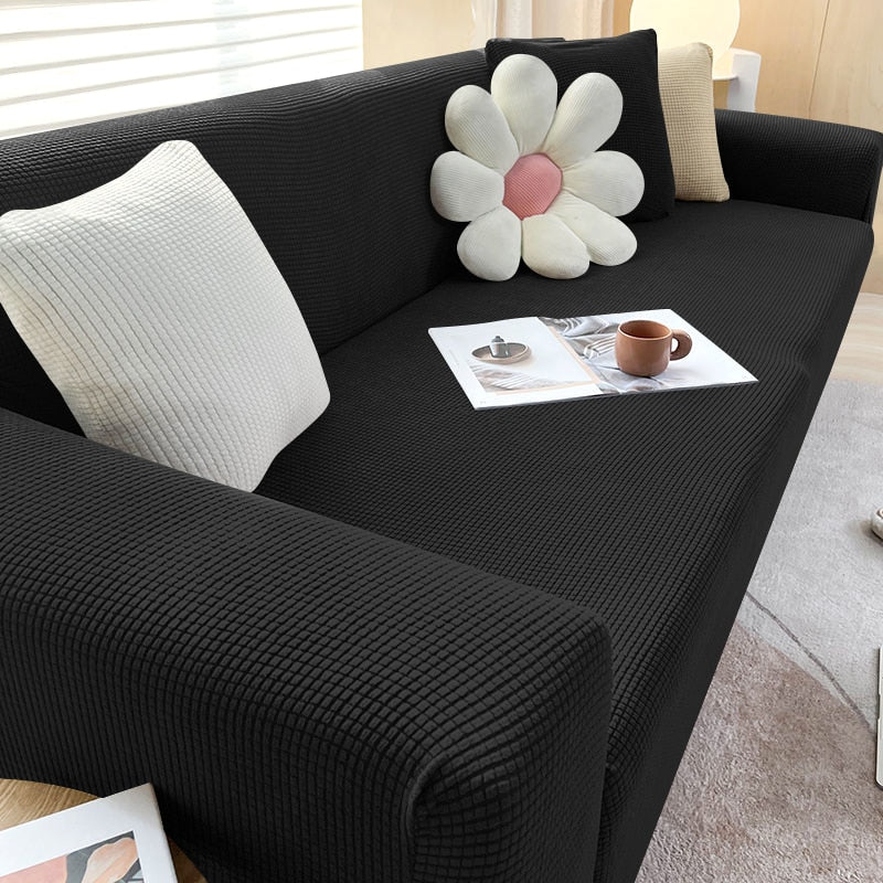 Mykt, flekksikkert sofatrekk som gir sofaen et nytt, moderne utseende.