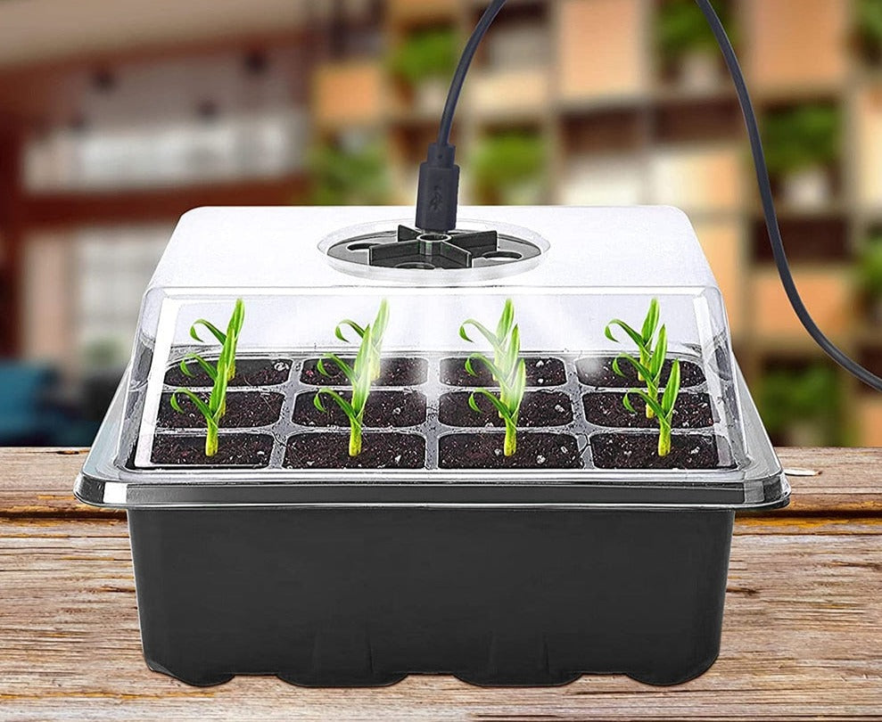 Komplett frøstartsett med vekstlys, klar for plantestart. Essensielt hagetilbehør for hjemmedyrking.