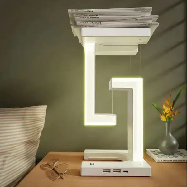Unik Tensegrity bordlampe med LED-lys, futuristisk design og trådløs lading. Perfekt som moderne interiørdetalj.