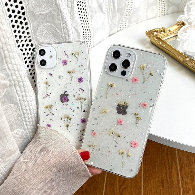 Mobil deksel med blomster: gjennomsiktig iPhone-beskytter som viser telefonens farge.