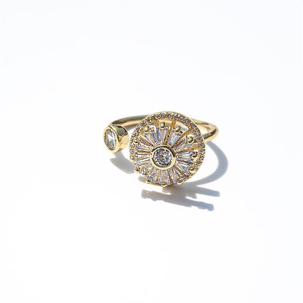 Kobber spinnerring med glitrende detaljer, stilig stresslindring for kvinner og beroligende smykke.