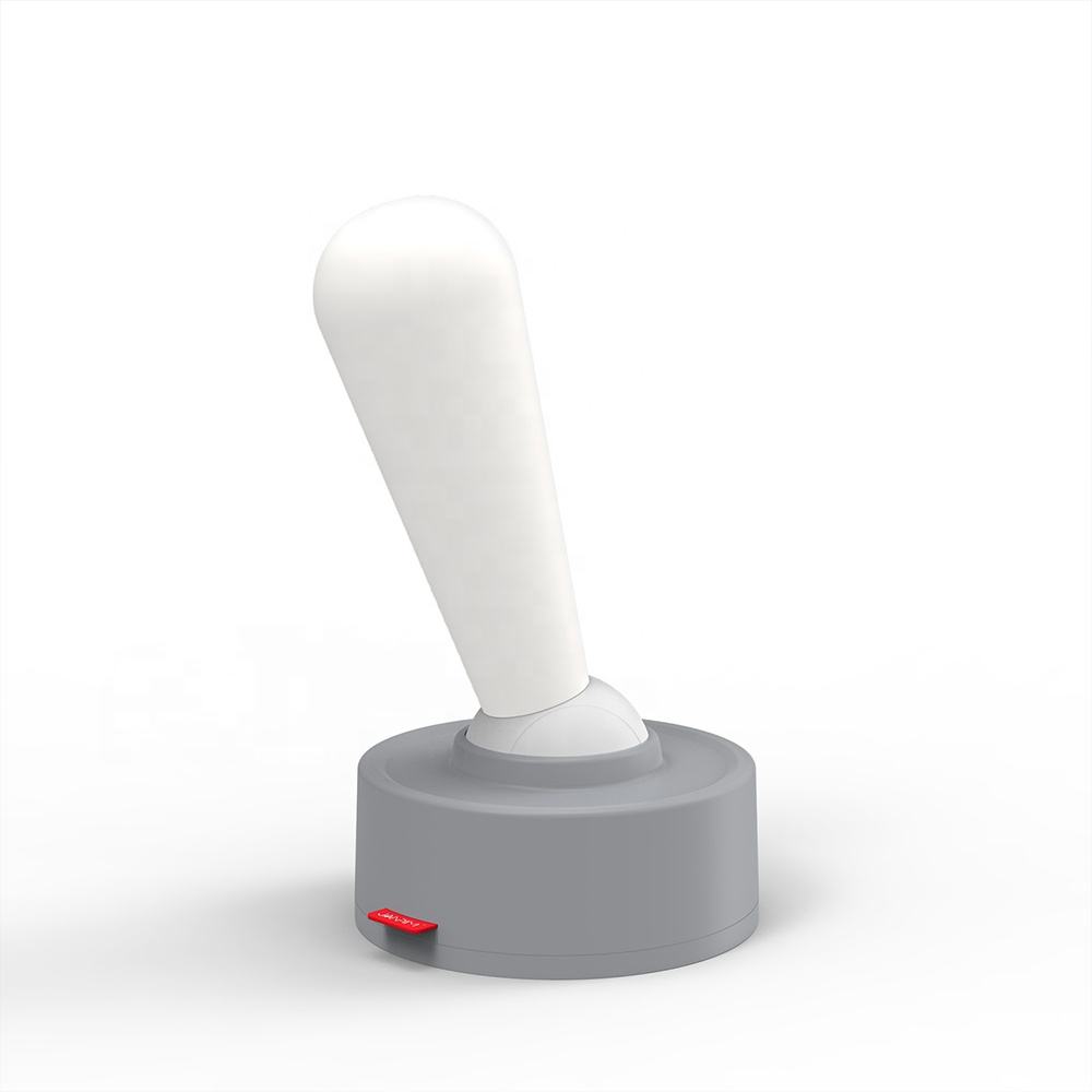 Grå og hvit bordlampe med retro spakbryter, LED-teknologi, oppladbar for fleksibel bruk, stilren minimalistisk design.