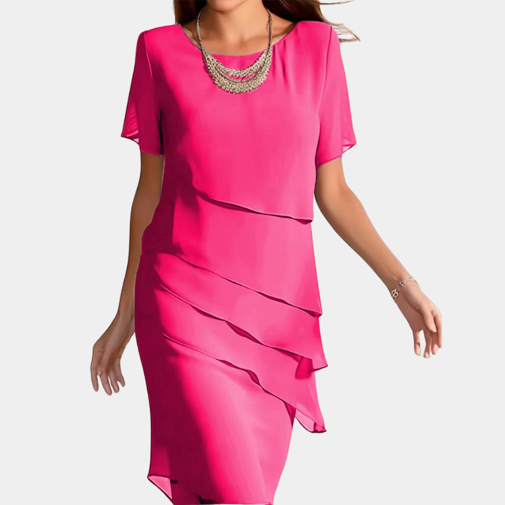 "Grønn Karmen midikjole i myk chiffon, middels lengde, elegant design for sommerdager, flatterende passform."