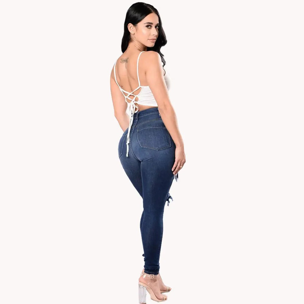 Streetwear-inspirerte rippede jeans for kvinner med høy midje. Perfekt for en casual og stilig look.