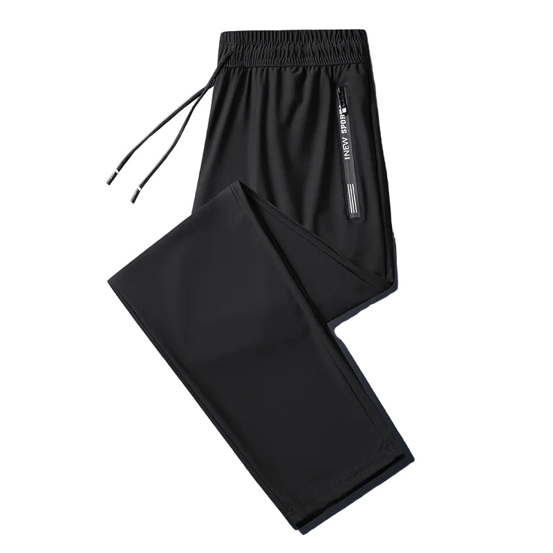 Herre joggebukse i bomullsblanding, sort, med praktiske glidelåslommer for en komfortabel og sporty stil.