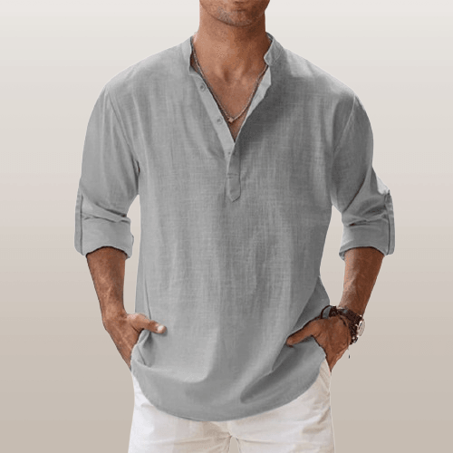 Ensfarget langermet henley for herre, som kombinerer komfort med en uformell, stilfull uttrykk.