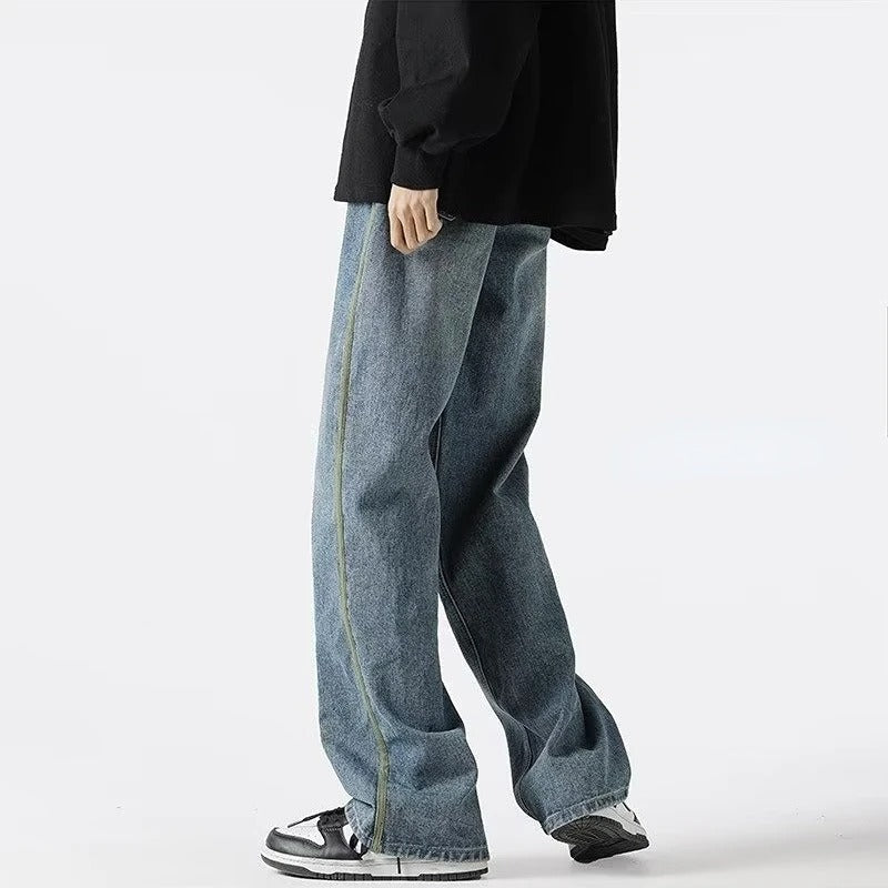 Trendy oversized herrejeans med elastisk midje, perfekt for casual hverdagsstil og komfortabel passform.
