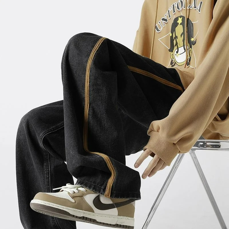 Komfortable herre oversized jeans med elastisk midje. Moderne design, ideell for avslappet og stilig hverdag.