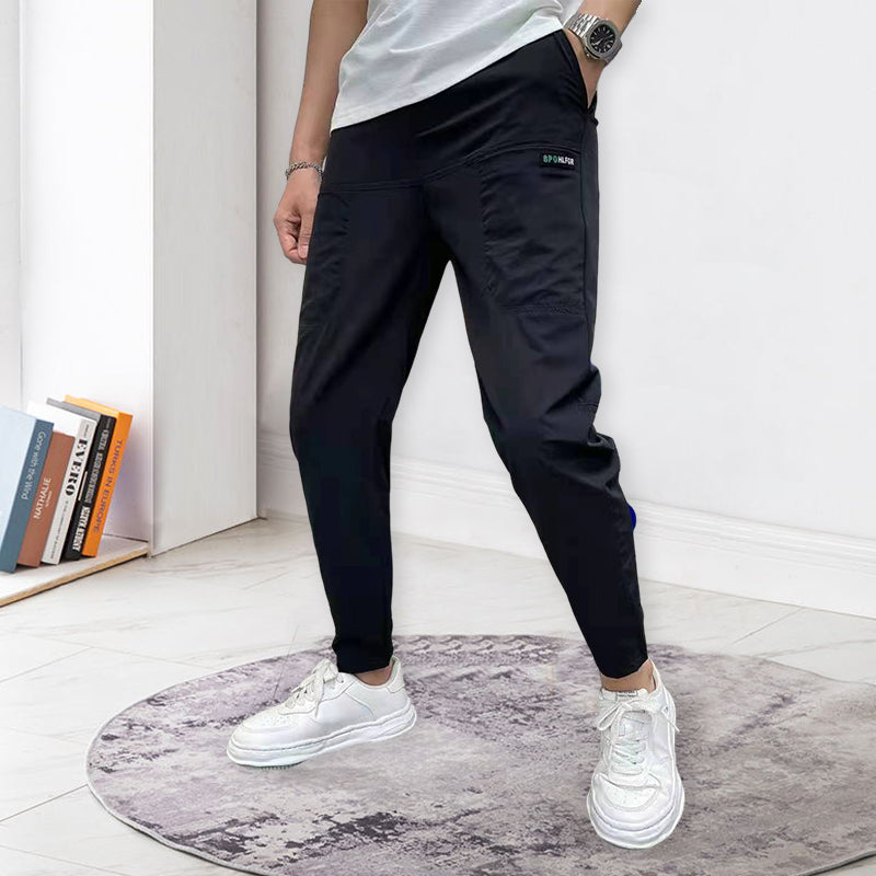 "Herre skinny cargo-bukser, høy stretch, flere lommer, svart farge, moderne design for stilfulle menn."
