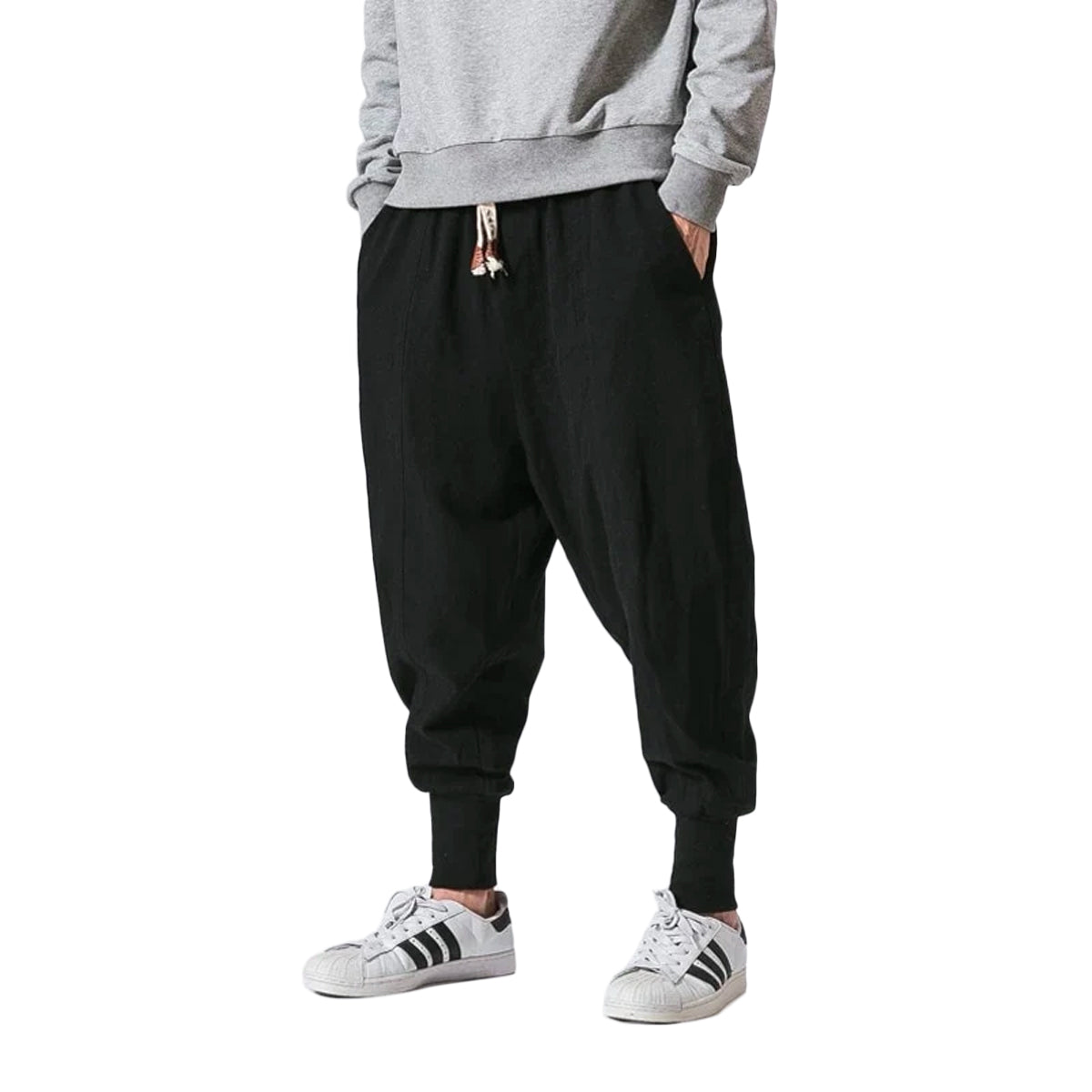 Herrebukser: Komfortable løse harembukser i bomull og lin for menn i avslappet fritidsstil.