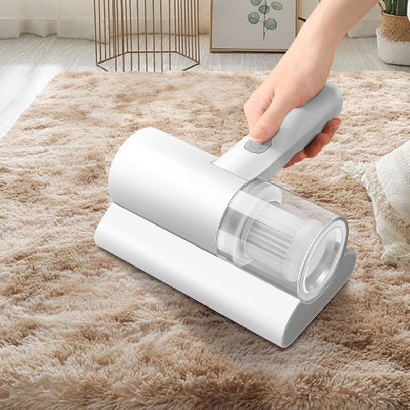 "Høyfrekvent madrass støvsuger: hvit, kompakt design med glatt finish. Med HEPA-filter og kraftig sugeevne for middfjerning."
