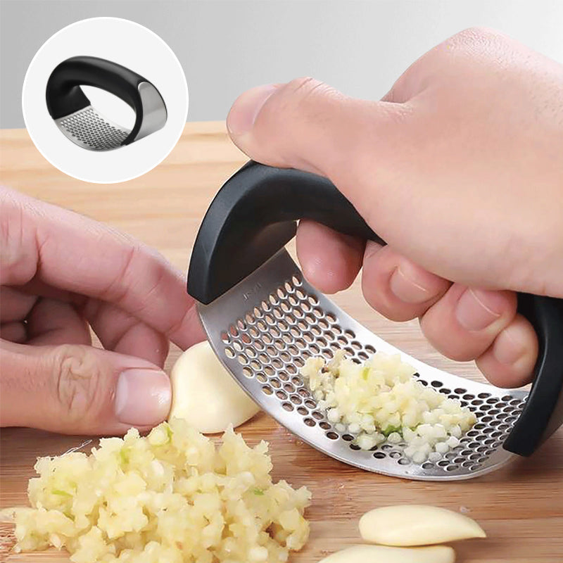 "Hvitløkpress i rustfritt stål med ergonomisk håndtak, skinnende overflate og enkel rengjøring for effektiv matlaging."