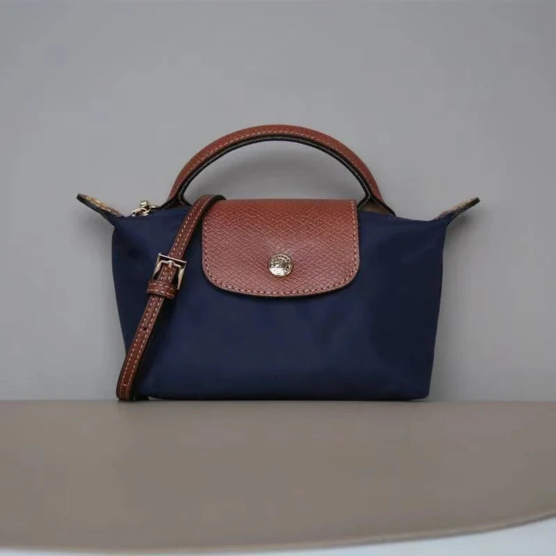 "Justerbar skulderveske i beige, blå, grå, svart. Elegant og kompakt mini-veske med justerbar stropp for kvinner."