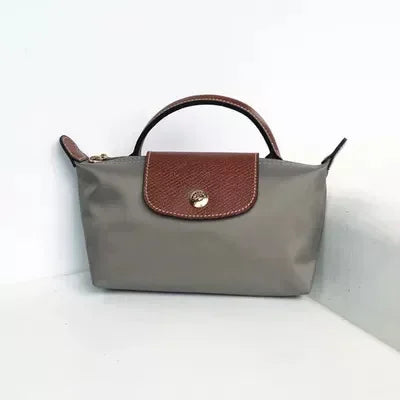 "Justerbar skulderveske i beige, blå, grå, svart. Elegant og kompakt mini-veske med justerbar stropp for kvinner."