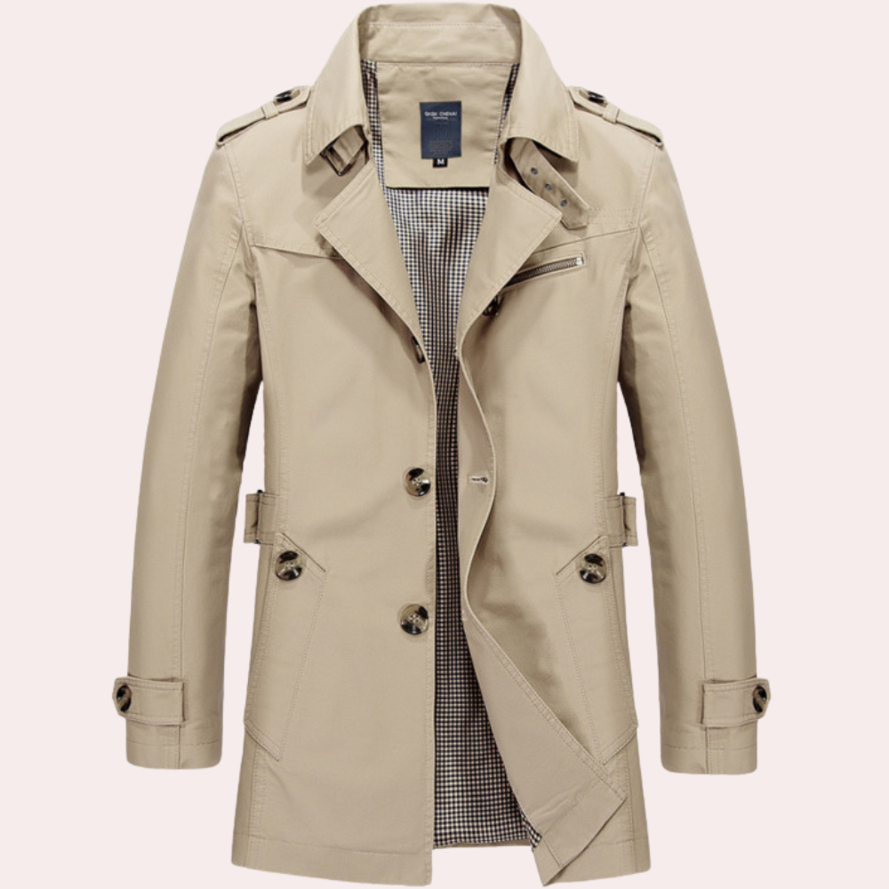 Elegant herre trenchcoat sett fra siden, viser slank passform og klassisk silhuett. Perfekt vårjakke for menn.