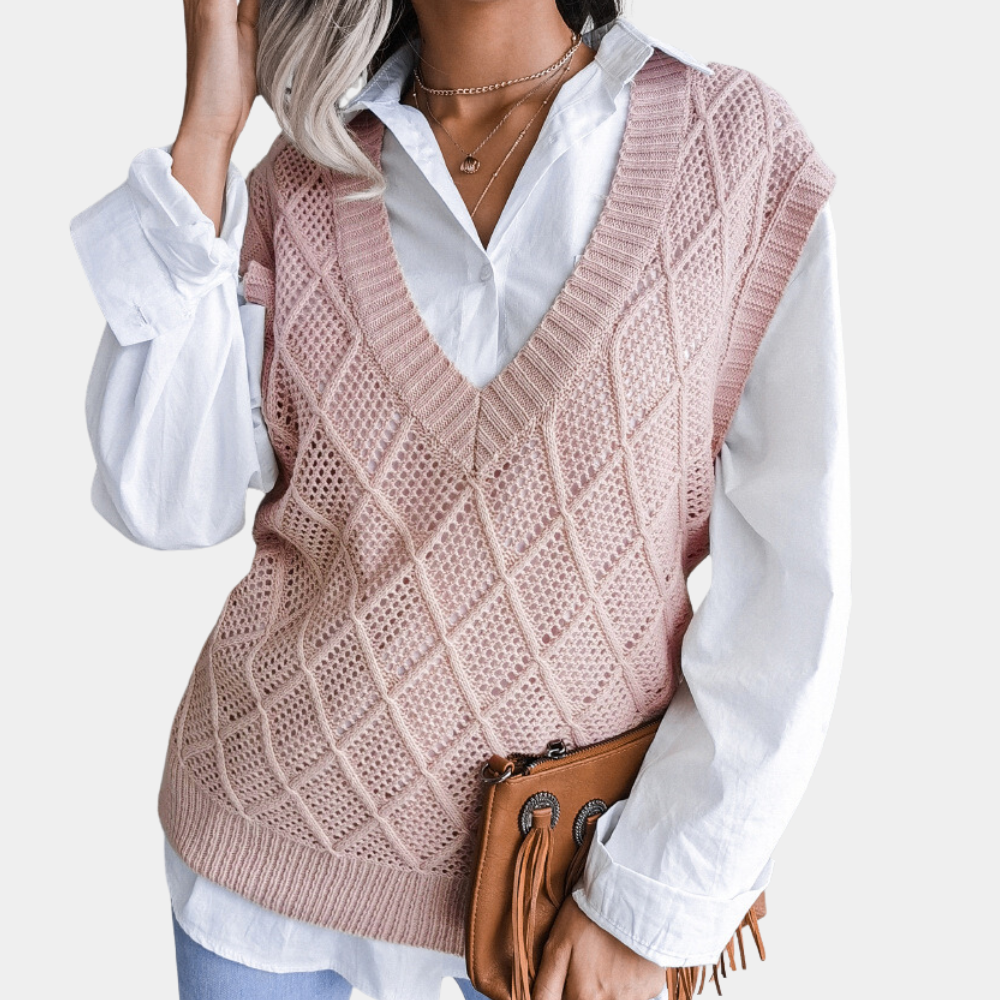 "Klassisk blå strikket vest for kvinner, lett og elegant design for hverdagsbruk."