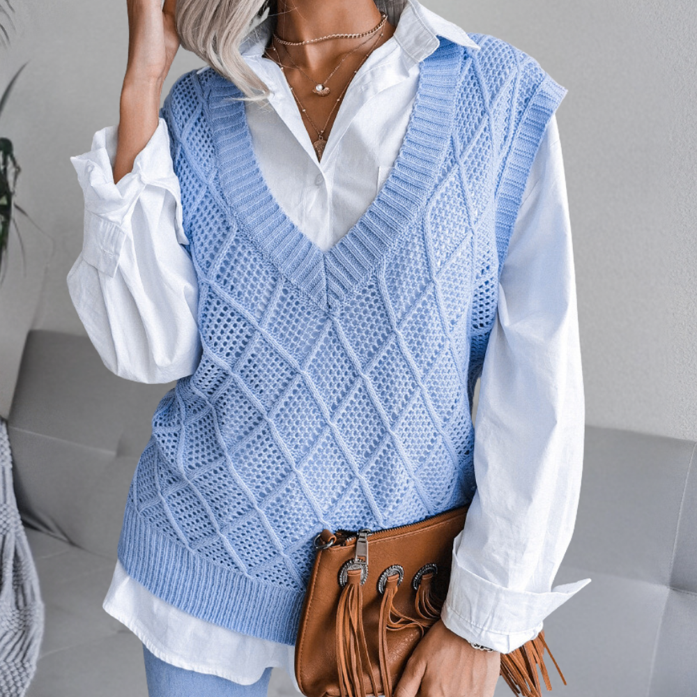 "Klassisk blå strikket vest for kvinner, lett og elegant design for hverdagsbruk."