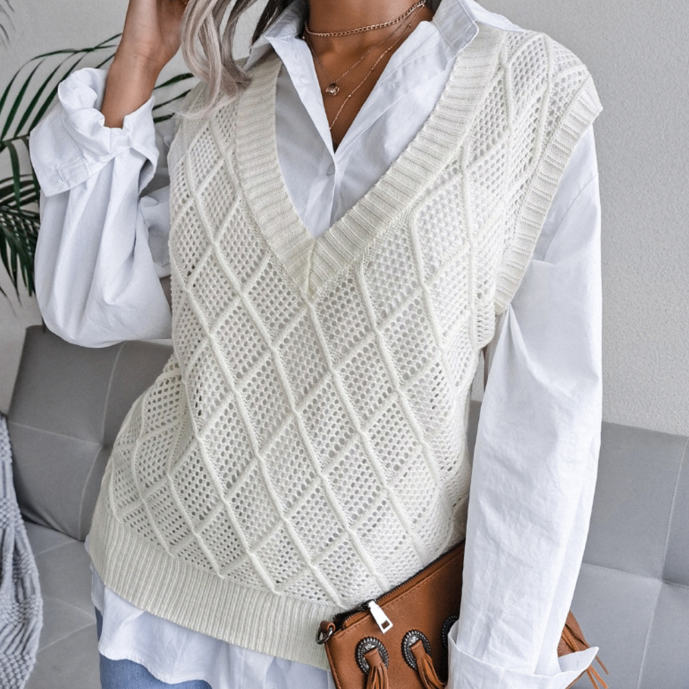 "Klassisk blå strikket vest for kvinner, lett og elegant design for hverdagsbruk."