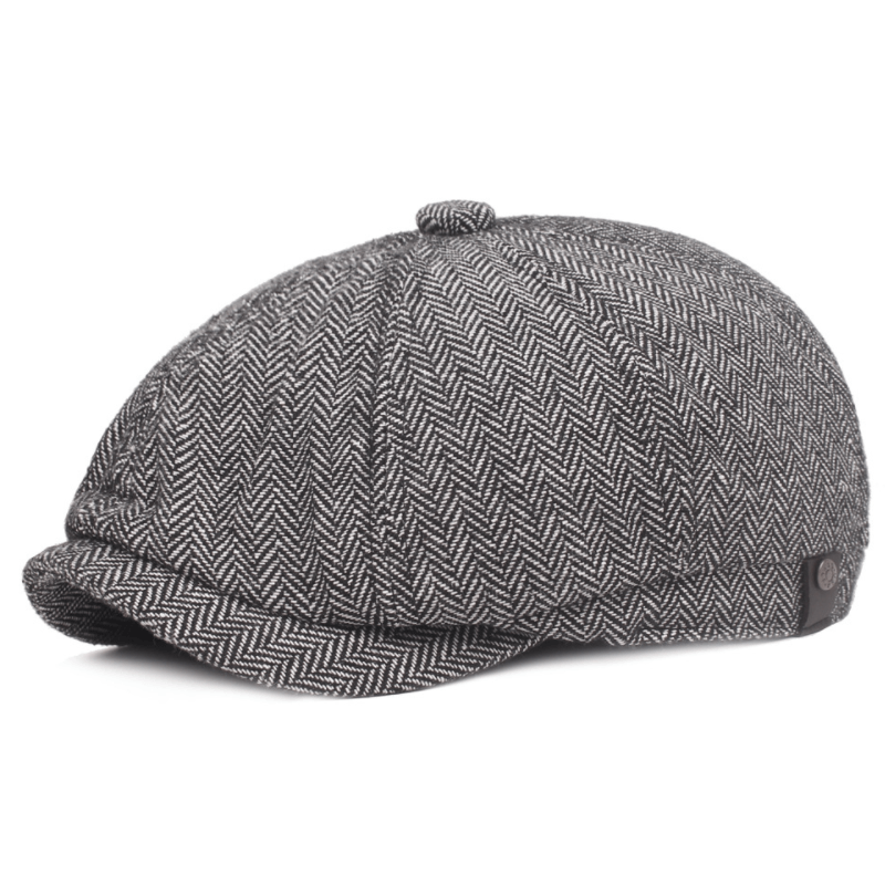 "Klassisk retro sixpence hatt i bomull, elegant grå tone, justerbar passform for stilfull og komfortabel hodebekledning."