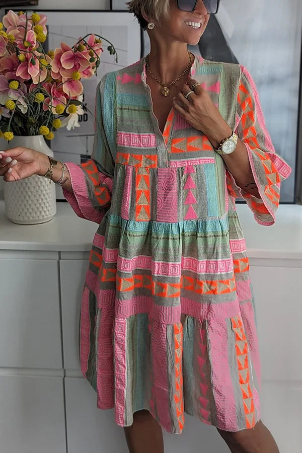 Flatterende rosa vintagekjole for kvinner. Feminin og komfortabel damekjole som gir en klassisk elegant look.
