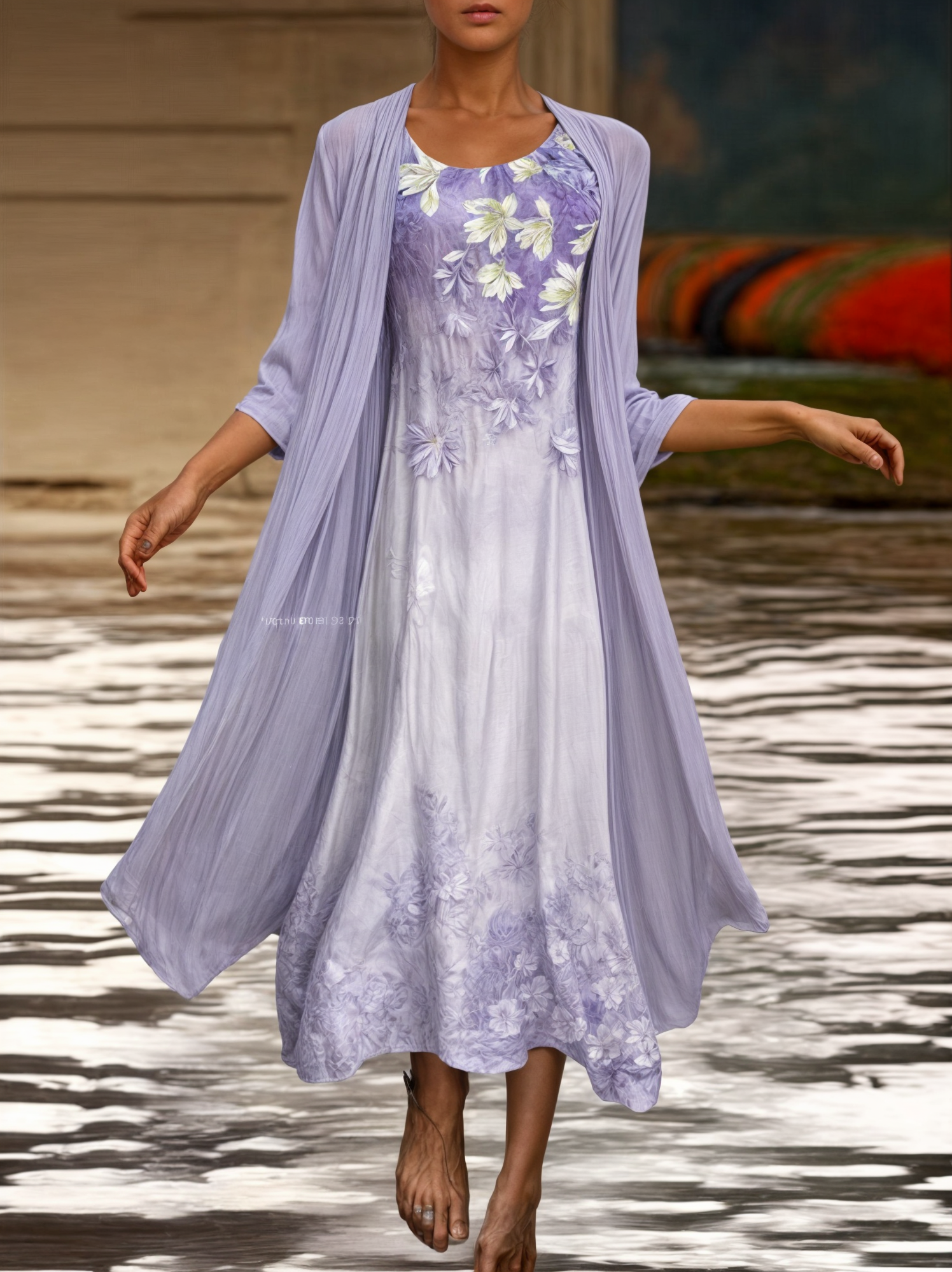 Sjarmerende knelang kvinnekjole med blomstermønster og elegant cardigan for en ferdig look.