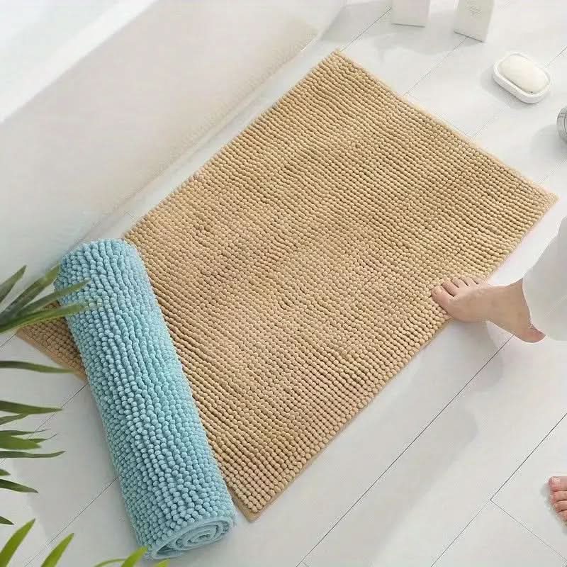 Blå, vaskbar badematte; slitesterk med sklisikker bunn for ditt baderom.