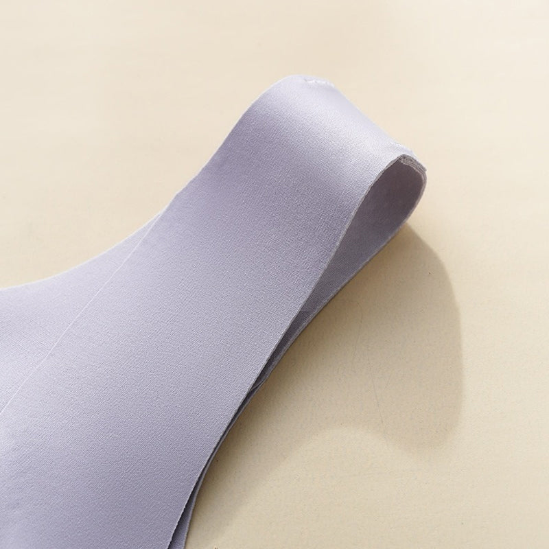 "Komfortabel trådløs BH med full dekning, sidesupport og anti-sag i beige nylon, perfekt for daglig bruk."