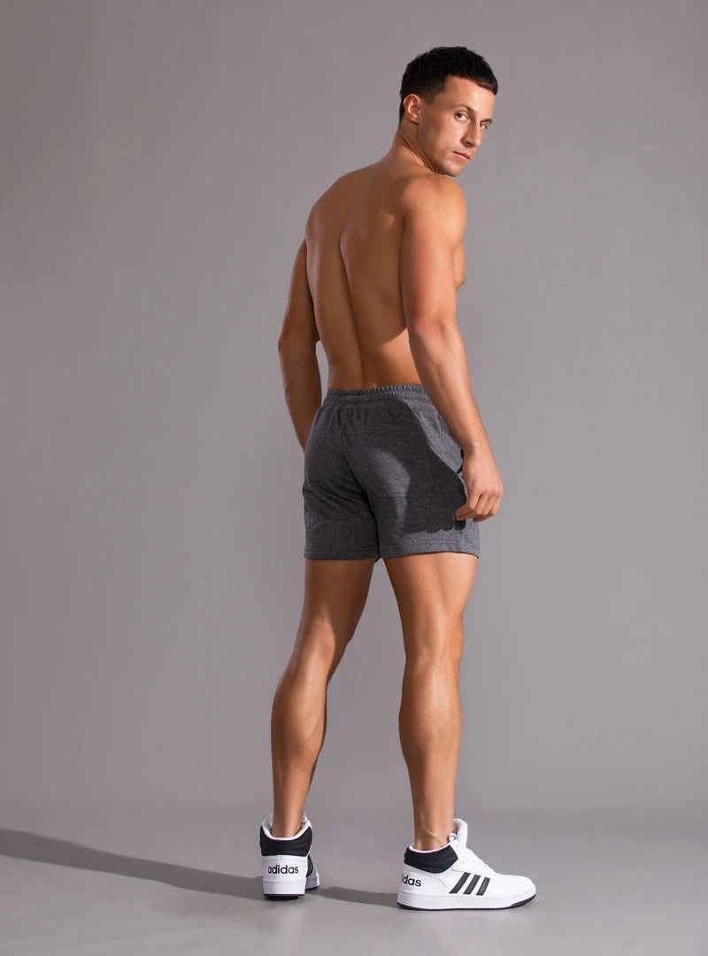 Stilige marineblå fritidsshorts for menn. Allsidige herreklær, ideelle for avslappede dager og sommer.