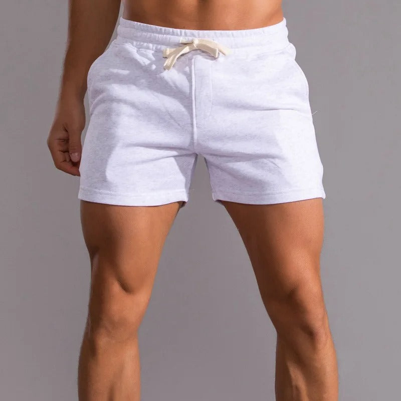 Nærbilde av stofftekstur på herreshorts. Høy kvalitet og komfortable for menn, ideell for sommer.
