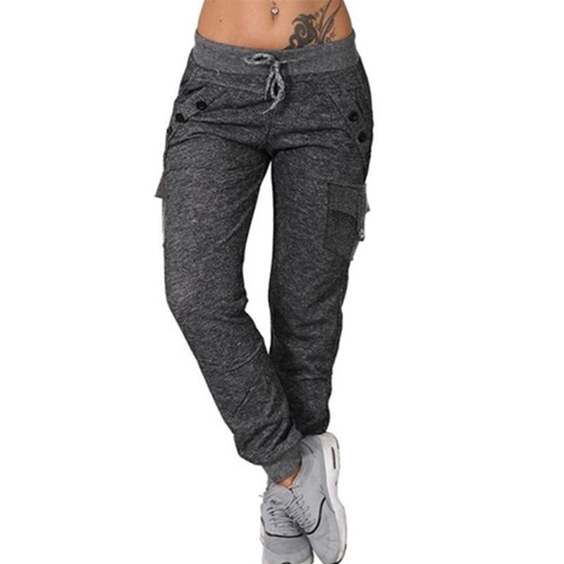 Komfortable joggebukser med snøring, lommer og elastisk midje for kvinner. Perfekt for trening og avslapning i moderne stil.