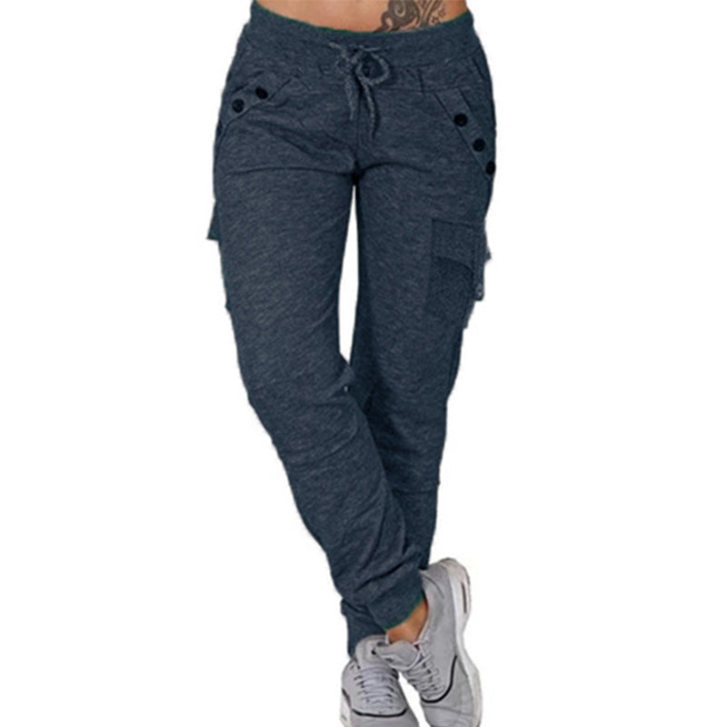 Komfortable joggebukser med snøring, lommer og elastisk midje for kvinner. Perfekt for trening og avslapning i moderne stil.