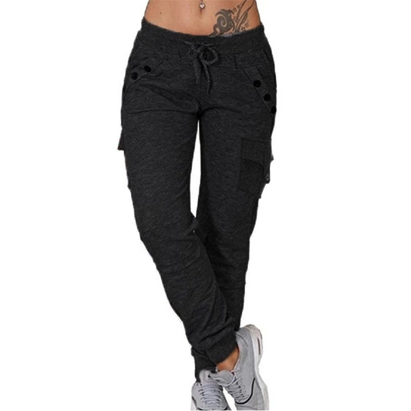 Komfortable joggebukser med snøring, lommer og elastisk midje for kvinner. Perfekt for trening og avslapning i moderne stil.
