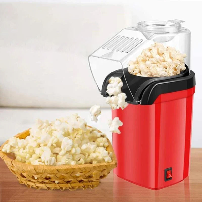 "Kompakt elektrisk popcornmaskin i rustfritt stål, stilren design. Ideell for rask hjemmebruk, enkel å betjene."