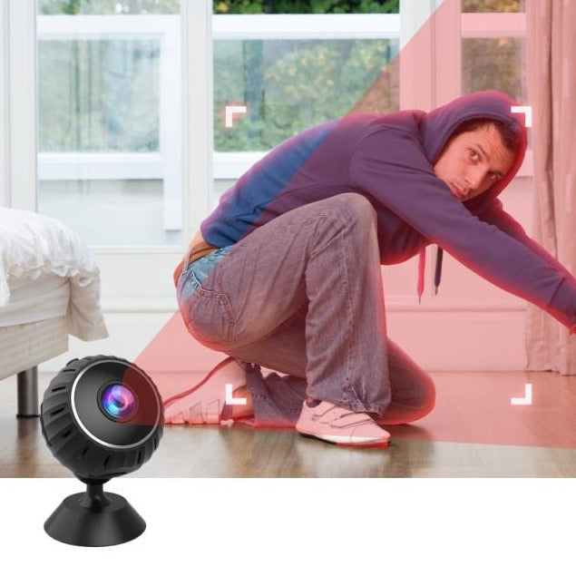 "Kompakt WiFi mini-sikkerhetskamera med 1080P HD, svart design, bevegelsesdeteksjon og infrarødt nattsyn."