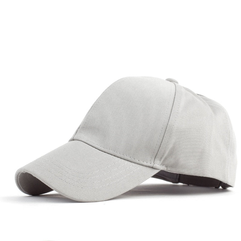 Rosa baseballcaps med åpen bakside for hestehale, funksjonelt og moteriktig tilbehør.