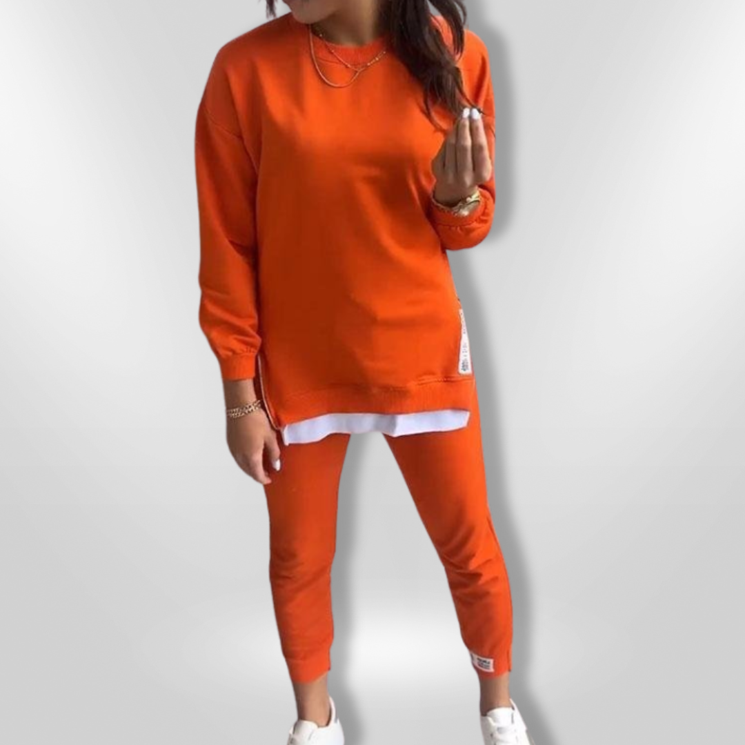 Grått komfortabelt loungewear sett for kvinner. Myk oversized sweatshirt og matchende joggers.